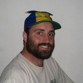 Portrait de Jean Tessier wearing a Noogler's beanie